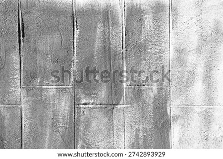 Gray cement block wall with rough texture for industrial architecture and construction concept
