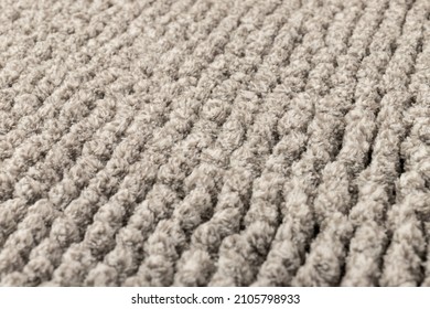 Gray chenille soft bath mat texture background. Bath Accessories. Close up.
