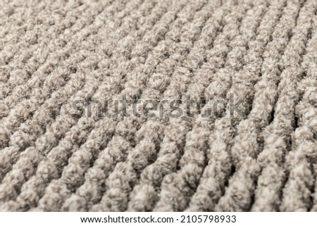 Gray chenille soft bath mat texture background. Bath Accessories. Close up.