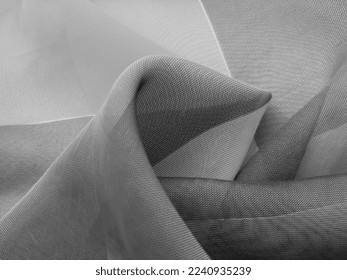 Gray chiffon, in folds (macro, folds pattern, gray background, black and white positive, texture)
