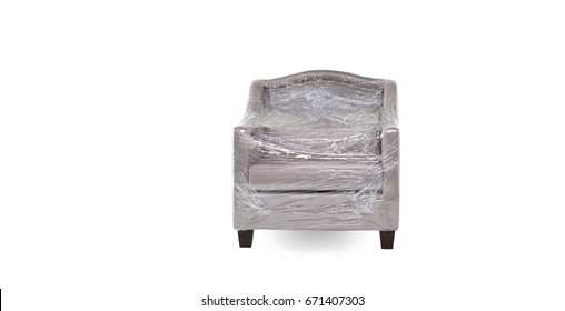 Gray Cloth Armchair Placed On A White Background,  Cover With Plastic Inserts.