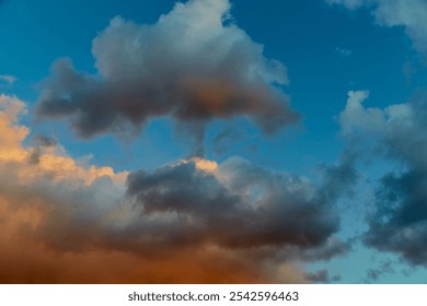 gray clouds before sunset, bright sky with clouds at sunset, 