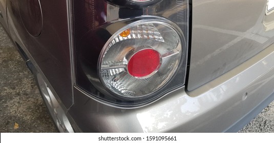 gray color small city car backlight brake lights