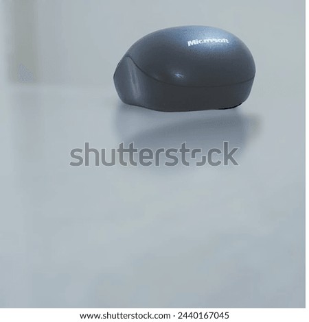 A gray colored mouse by Microsoft very comfortable in use 
