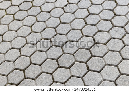Gray concrete tiling background, hexagonal paving slabs pattern