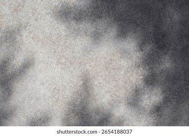 Gray concrete wall empty copy space background with sunlight and leaves shadows. Minimalistic luxury template wall surface concrete gray texture table top view copy space mock up background