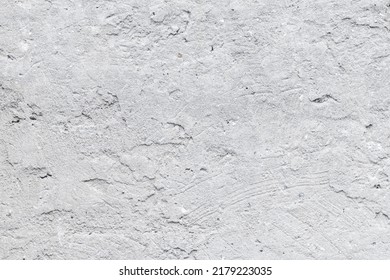 Gray concrete wall. Grunge texture, cement rough background. Design element. Abstract pattern, wallpaper. Empty space. Beton floor.