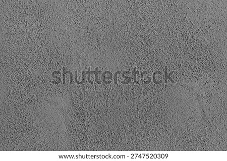 Gray concrete wall texture with a rough plaster surface and subtle imperfections, perfect for backgrounds, design projects, architectural mockups, overlays and industrial-themed visual compositions.