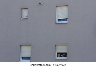 Gray facade wall with windows 