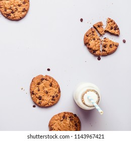 gray food Background with chocolate chip cookies and bottle of milk. - Powered by Shutterstock