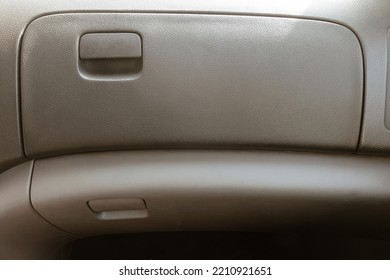 Gray Glove Box On The Passenger Panel Side Of The Car