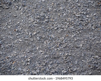 a lot of gray gravel. Gray background