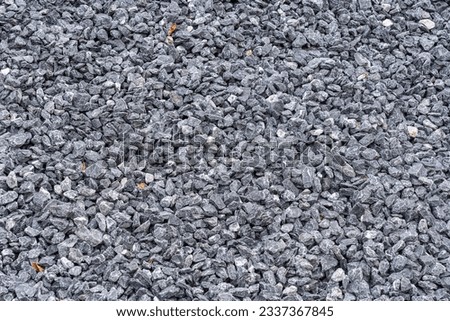 Gray gravel or breakstone background. Close up.