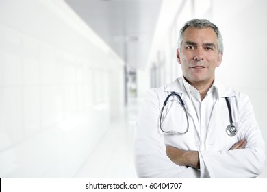 gray hair expertise handsome senior doctor hospital portrait white corridor [Photo Illustration] - Powered by Shutterstock