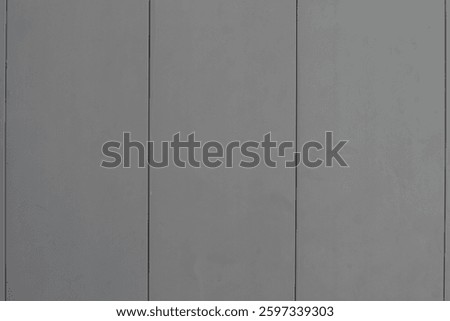 Gray hard plastic surface with straight stripes