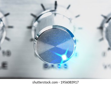 Gray hifi knobs from a stereo amplifier.