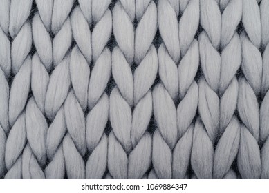 Gray Knitted Blanket From Merino Wool, Super Chunky Yarn. May Used As Background.