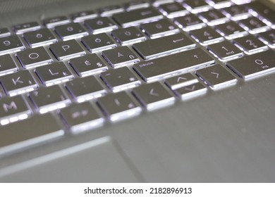 Gray Laptop With Illuminated Keyboard