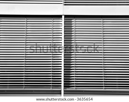 Similar – Two windows with closed shutters