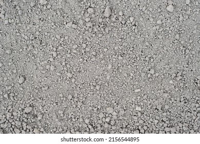 Gray Loose Dry Soil. Earthy Texture Background With Small Lumps, Top View.