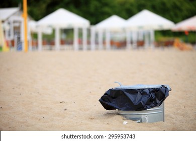 Gray Metal Garbage Bin Or Trash Can With A Plastic Bag Inside Beach Outdoor