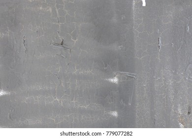 gray metallic non-uniform surface