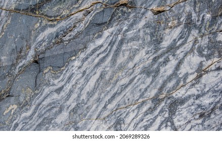 Gray Patterned Natural Of Dark Raw Marble Texture Background. Texture Of Raw Stone, Marble In Natural Light. Rough Natural Background.