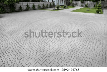 gray paving stones with herringbone pattern texture