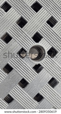 Gray plastic grid texture background with geometric lattice pattern for abstract industrial design