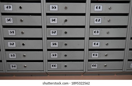 Gray Post Boxes In An Apartment Building 