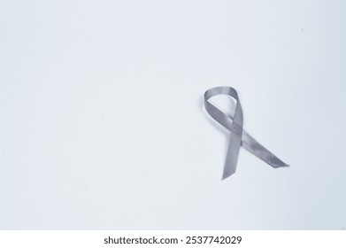 Gray ribbon symbol isolated on white background, symbol to commemorate the month of awareness for people with diabetes and cancer. Health and treatment concept - Powered by Shutterstock