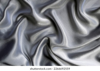 Gray satin fabric lies drapery, top view. - Shutterstock ID 2266692559