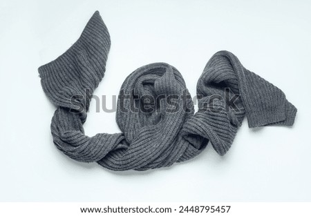 Gray scarf on a white background. Top view