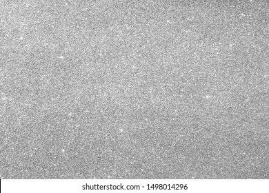 Gray silver glitter for texture or background.  Silver Seamless glitter sparkle pattern texture.