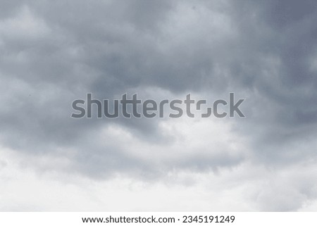 A gray sky with clouds
