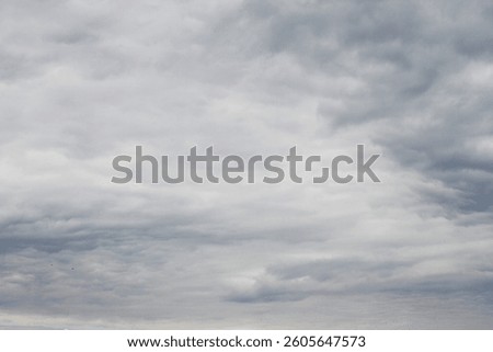 A gray sky with clouds