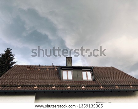 Gray sky and house