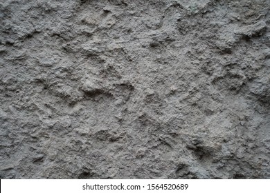Gray stone, rock surface texture, grunge stone wall background.