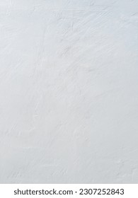 Gray, texture background of white cement walls, empty grey interior Spaces empty and soft circular light are also used as a background for a montage or display of products or texts promoting stuff 