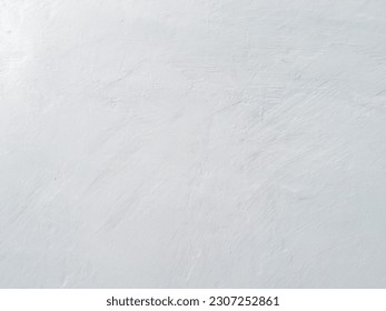 Gray, texture background of white cement walls, empty grey interior Spaces empty and soft circular light are also used as a background for a montage or display of products or texts promoting stuff 