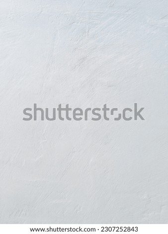 Gray, texture background of white cement walls, empty grey interior Spaces empty and soft circular light are also used as a background for a montage or display of products or texts promoting stuff 