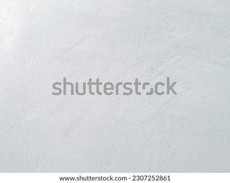 Gray, texture background of white cement walls, empty grey interior Spaces empty and soft circular light are also used as a background for a montage or display of products or texts promoting stuff 