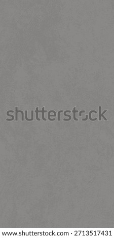 Gray textured surface with subtle variations in tone and pattern