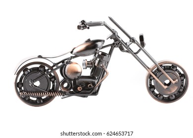 Gray toy metal motorcycle on white background