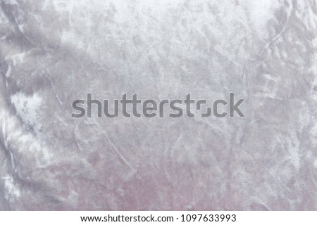 Gray velvet background or velor texture of cotton or wool with soft fluffy velvety fabric.