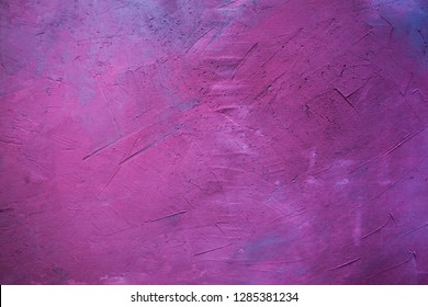 Gray Wall Painted In Pink, Mauve And Purple. Visible Plaster Texture. Abstract Background