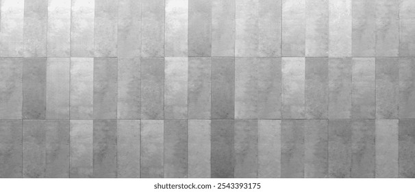 A gray wall with a pattern of squares. The wall is made of concrete and has a very clean, modern look