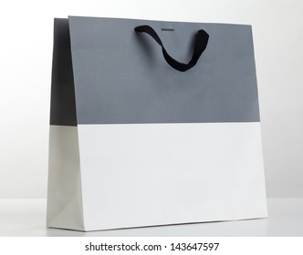 Gray and white shopping bag on white. - Powered by Shutterstock