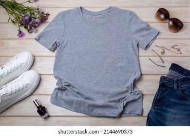 Gray Womens Cotton T-shirt Mockup With Burdock Flowers, Blue Nail Polish, Necklace And Sunglasses. Design T Shirt Template, Tee Print Presentation Mock Up