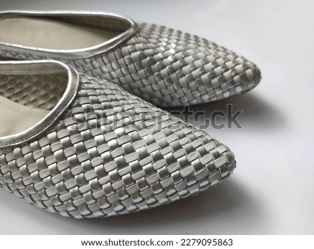 Gray women's sandals isolated on white background.